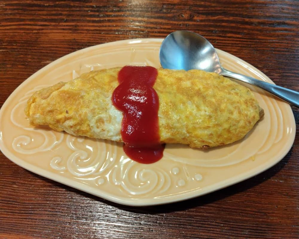 黒磯駅近くの居酒屋「みこし」の「納豆オムレツ」の写真