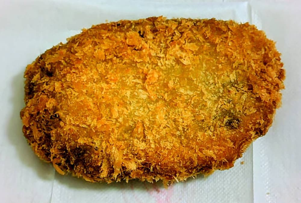 ミートショップかなざわのジャンボメンチの写真