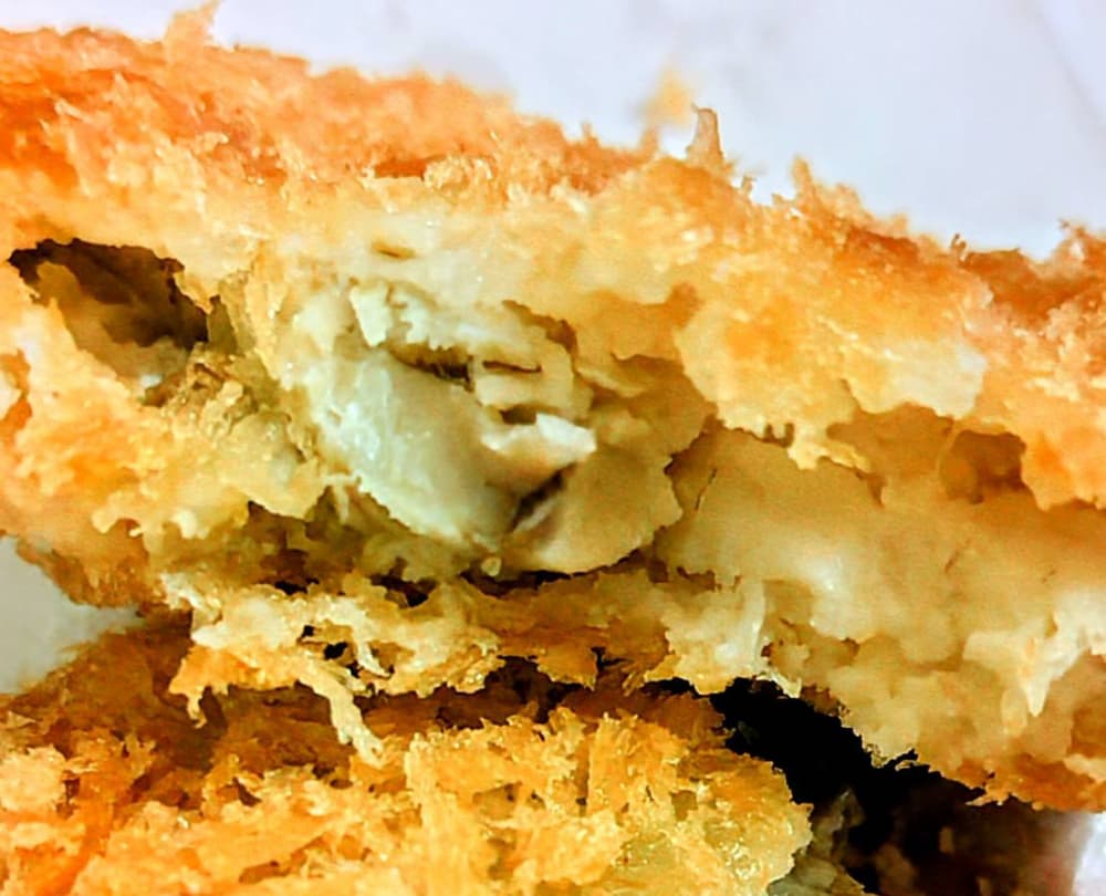 ミートショップかなざわのお魚フライの割面の写真