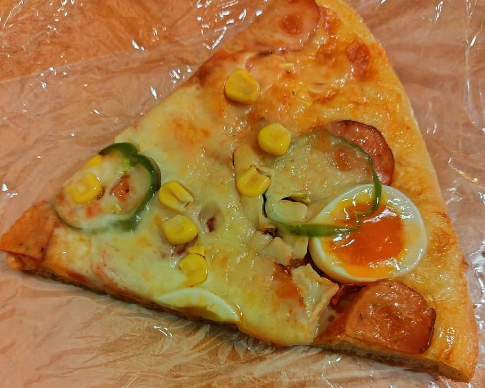 パン屋「malco」で購入した「malcomix（ピザパン）」の写真